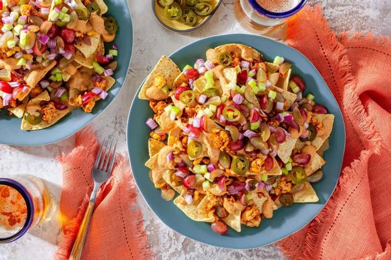 Smoky tempeh nachos with cucumber-grape salsa and chipotle cashew sauce